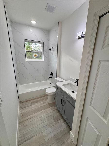 Furnished interior view inside a new home in , Dunnellon (Image 9).