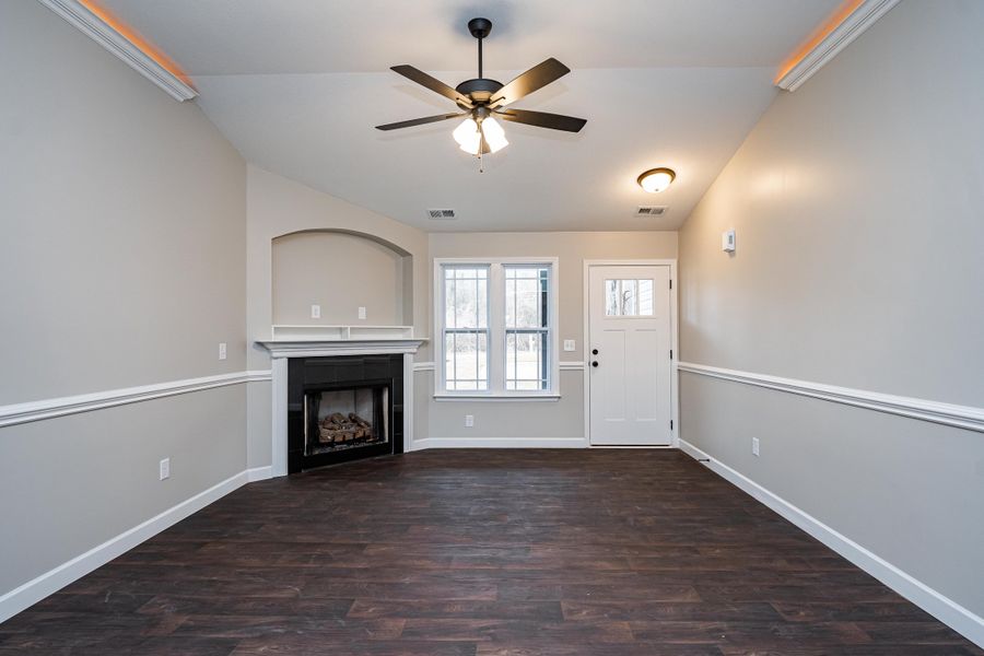 Representative unfurnished interior of a home built from the Saxon by Enchanted Homes in Guadalupe Heights, Seguin (Image 45).