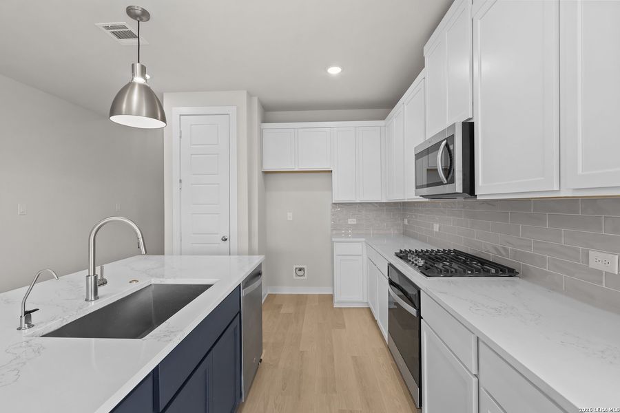 Furnished interior view inside a new home in Davis Ranch, San Antonio (Image 18).