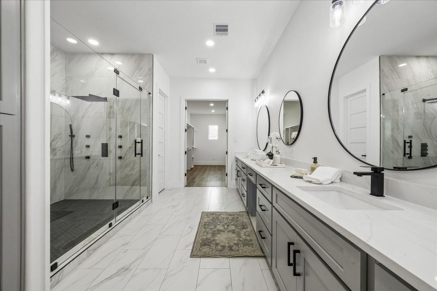 Thoughtfully designed Primary Bath that features an oversized walk in shower, dual vanity sinks with ample storage! Thoughtfully designed Primary Bath that features an oversized walk in shower, dual vanity sinks with ample storage!