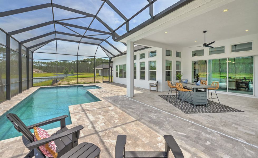 Exterior details and patio area of a home in Plantation Bay, Ormond Beach (Image 4).