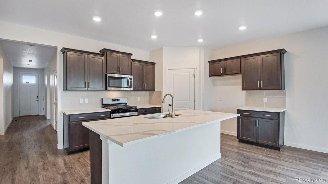 Furnished interior view inside a new home in Trails at Crowfoot, Parker (Image 16).