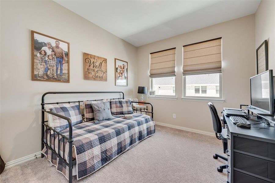 Bright room with carpet flooring, light-toned walls, and two large windows featuring Levolor bottom up-top down shades Bright room with carpet flooring, light-toned walls, and two large windows featuring Levolor bottom up-top down shades