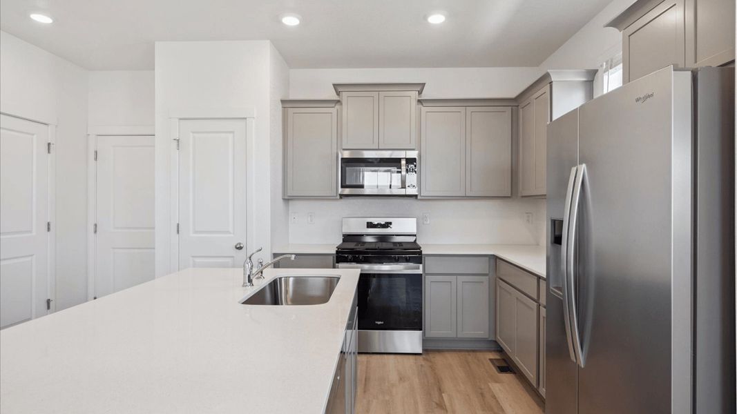 Furnished interior view inside a new home in Settlers Crossing, Commerce City (Image 7).