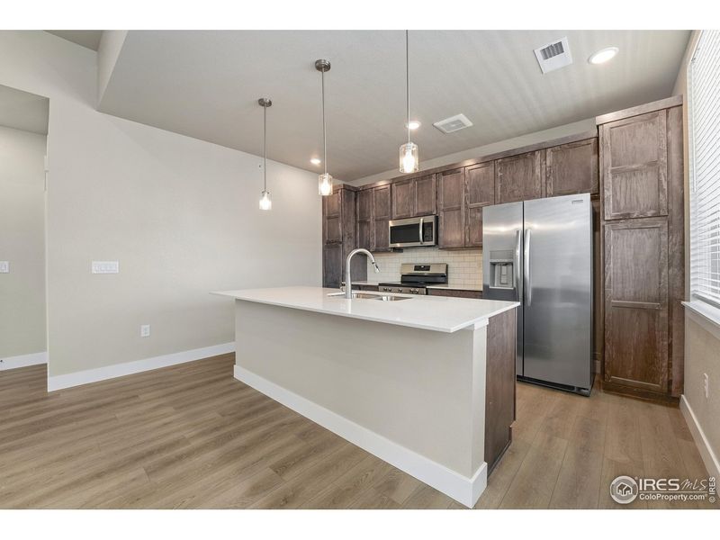 Furnished interior view inside a new home in Northfield - The Flats, Fort Collins (Image 6).