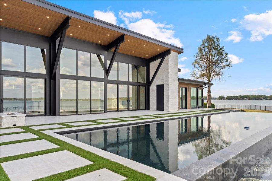 60’ Double Infinity Edge Saltwater Lap Pool w/ Cabo Shelf & Integrated Hot Tub