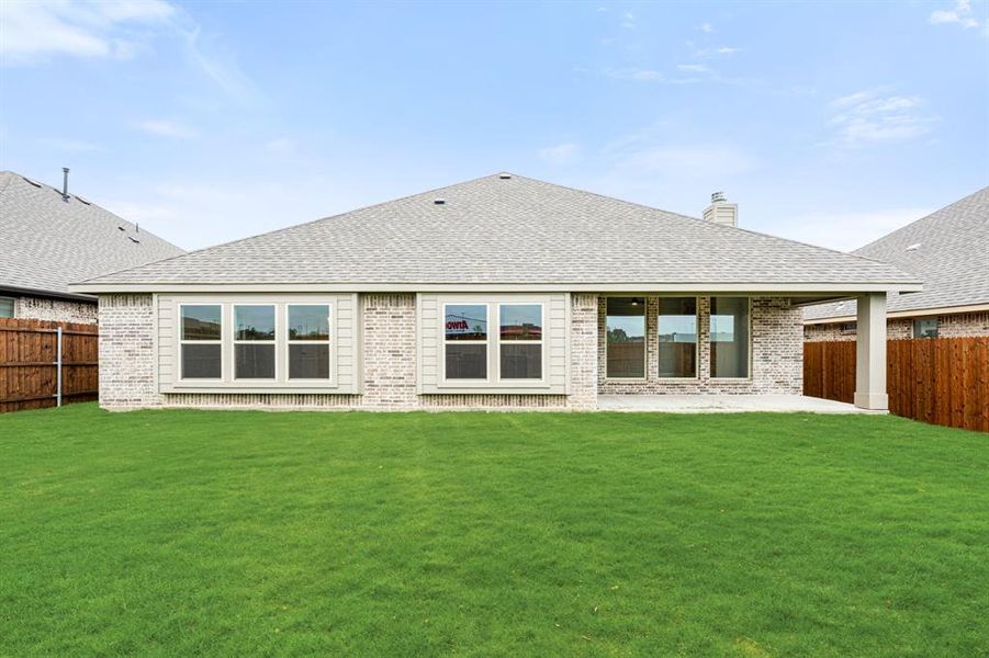 Front exterior of a new home in Sunset Ridge, Alvarado, TX, highlighting curb appeal (Image 2).