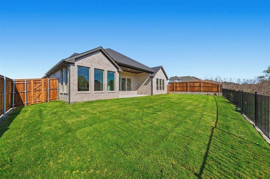 Exterior details and patio area of a home in Devonshire, Forney (Image 4). Exterior details and patio area of a home in Devonshire, Forney (Image 4).