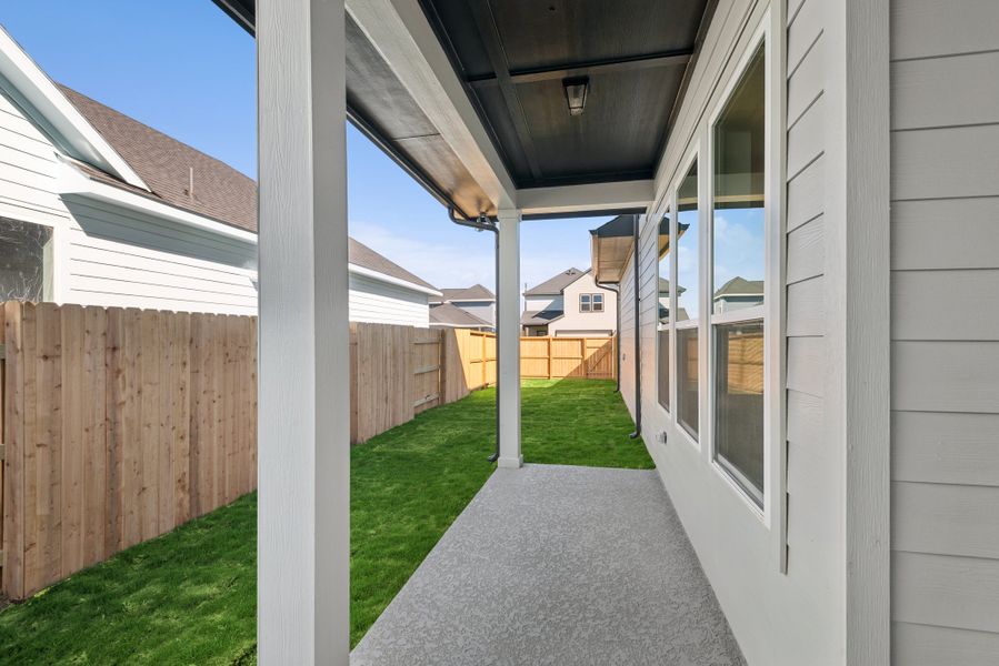 Exterior details and patio area of a home in Elyson 40', Katy (Image 3).