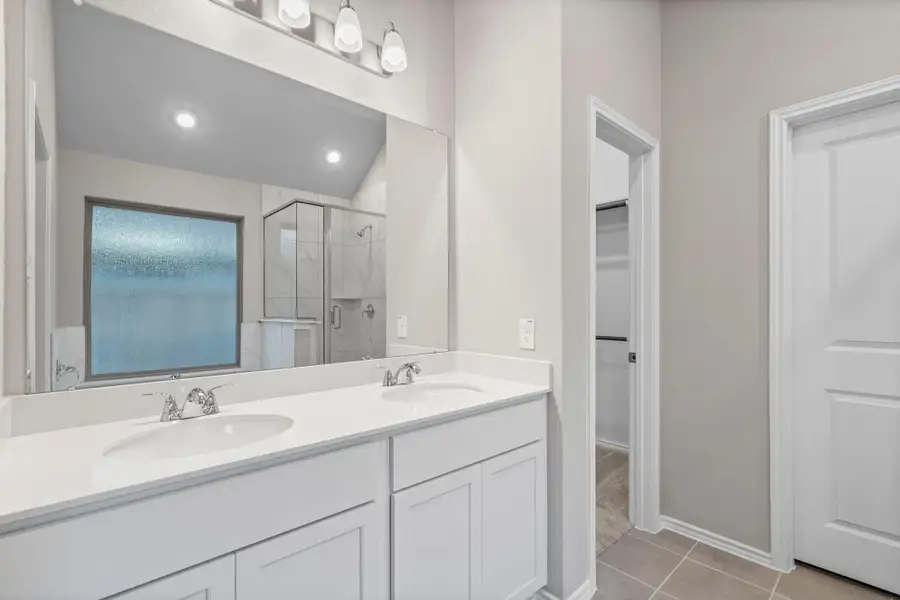 Furnished interior view inside a new home in Bridgeland, Cypress (Image 8).