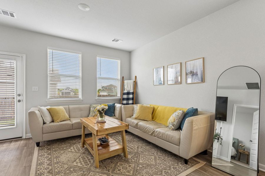 Furnished interior view inside a new home in Stallion Run, Buda (Image 9).