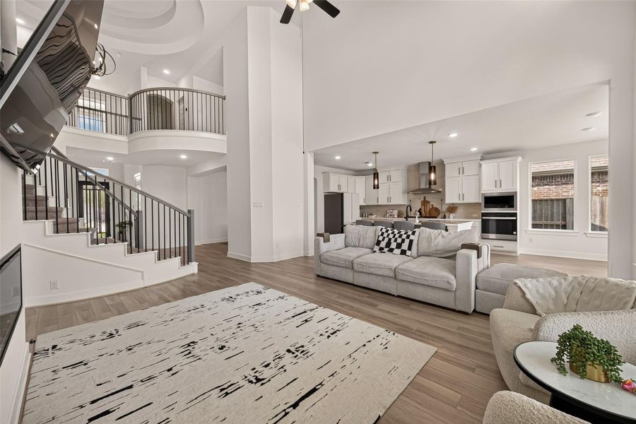 The open concept family room seamlessly connects to the kitchen for effortless entertaining. The open concept family room seamlessly connects to the kitchen for effortless entertaining.