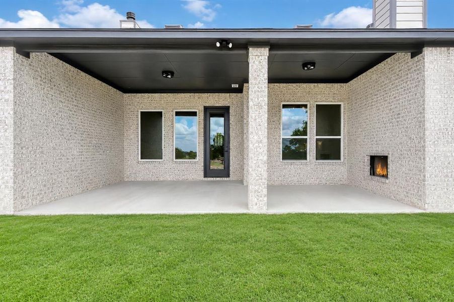 Exterior details and patio area of a home in , Poolville (Image 21).