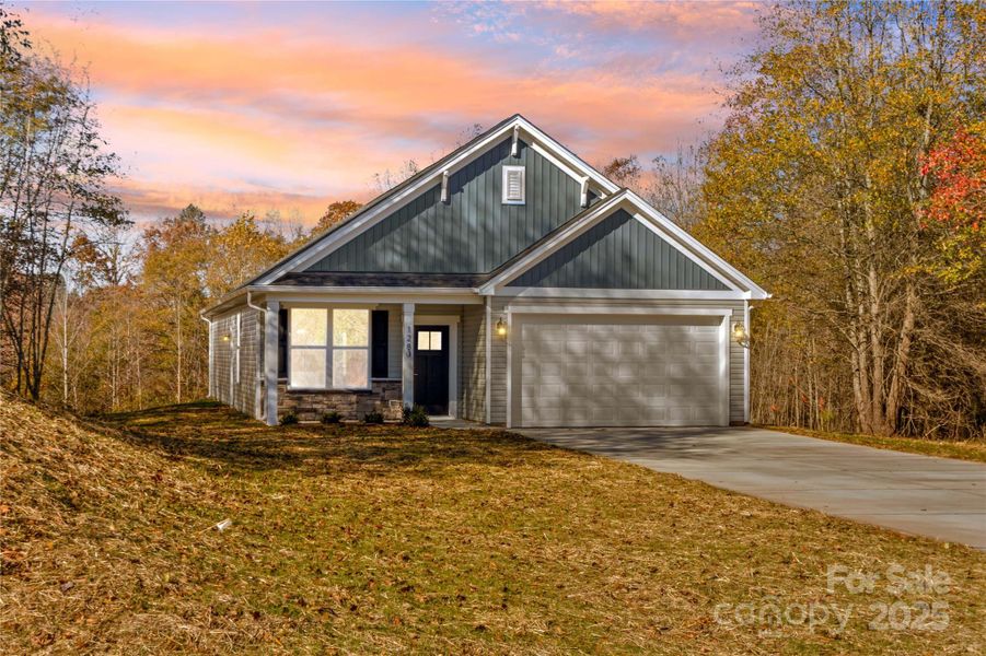 Front exterior of a new home in , Statesville, NC, highlighting curb appeal (Image 2). Front exterior of a new home in , Statesville, NC, highlighting curb appeal (Image 2).