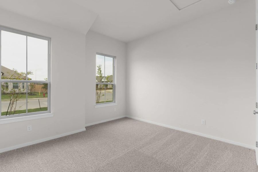 Representative unfurnished interior of a home built from the Madison by Chesmar Homes in University Heights, McKinney (Image 12).