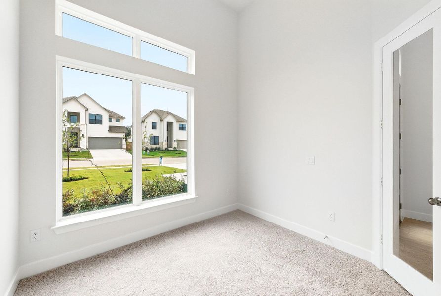 Spacious, unfurnished interior of a new home in The Colony, Bastrop (Image 30).