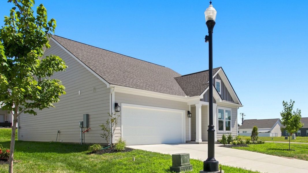 Exterior of Avondale floor plan with 2-car garage built in Shelbyville, TN