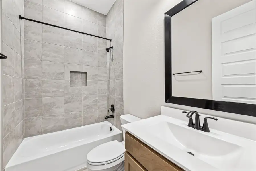 Furnished interior view inside a new home in The Highlands 40', Porter (Image 9). Furnished interior view inside a new home in The Highlands 40', Porter (Image 9).