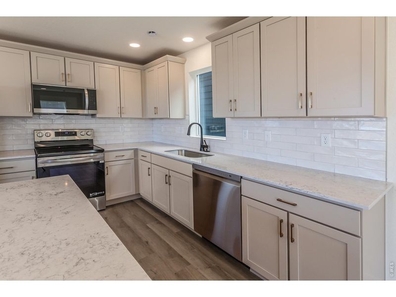 Furnished interior view inside a new home in Prairie Song Story Collection - Single Family Homes, Windsor (Image 6).
