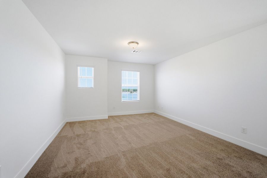 Spacious, unfurnished interior of a new home in Grande Estates, Bertram (Image 55).