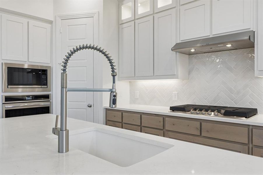 Close-up of interior finishes inside a home in Devonshire, Forney (Image 11).