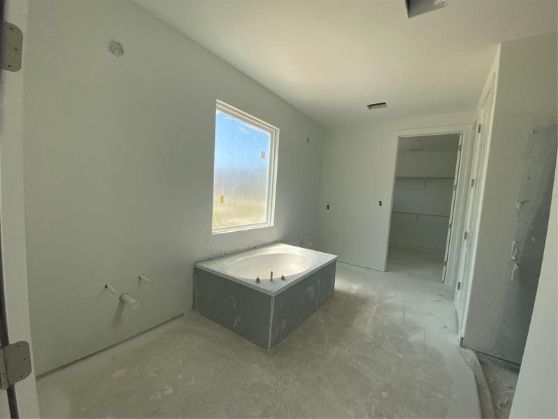 Primary Bath with dual vanities & garden tub
