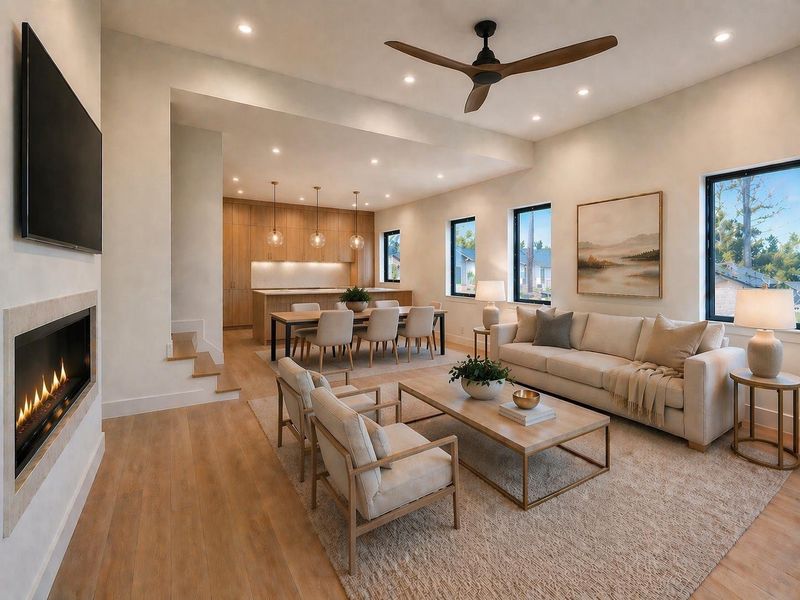 Spacious living and dining area with high ceilings and great natural light, creating an open and airy feel, with direct access to a balcony that extends the space and is perfect for entertaining.