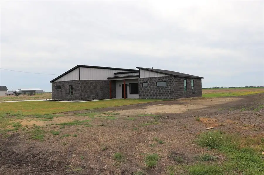 Exterior details and patio area of a home in , Avalon (Image 2). Exterior details and patio area of a home in , Avalon (Image 2).