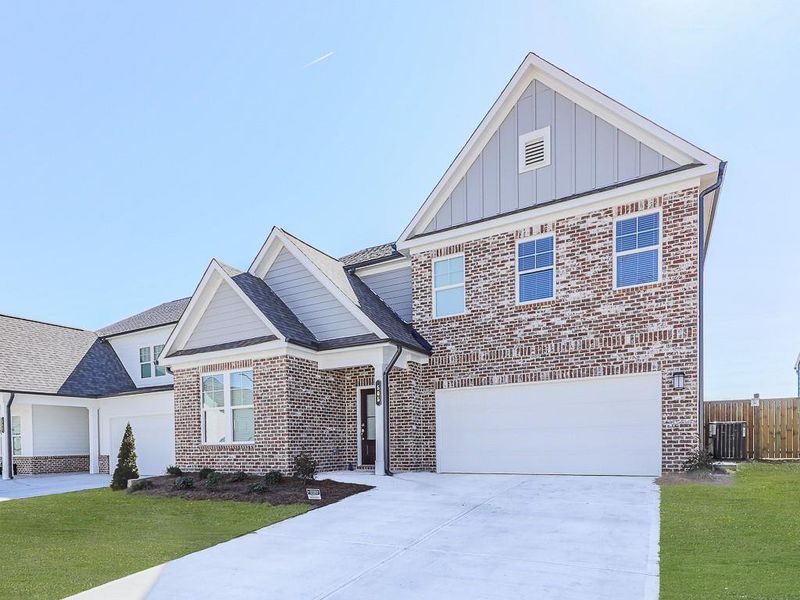 Front exterior of a new home in Kingsley, Acworth, GA, highlighting curb appeal (Image 26).