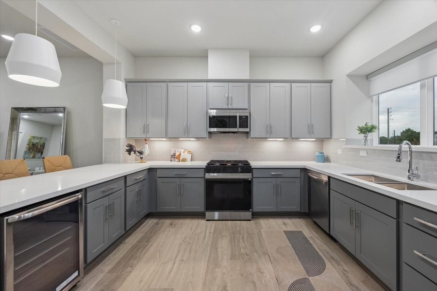 quartz countertops, shaker cabinetry, subway tile backsplash, SS Samsung Appliances - Photo is of model at 6340, finishes are similar. quartz countertops, shaker cabinetry, subway tile backsplash, SS Samsung Appliances - Photo is of model at 6340, finishes are similar.