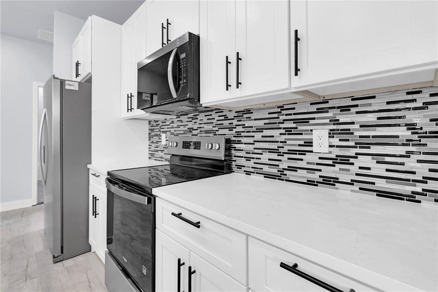 Furnished interior view inside a new home in , Kissimmee (Image 9). Furnished interior view inside a new home in , Kissimmee (Image 9).