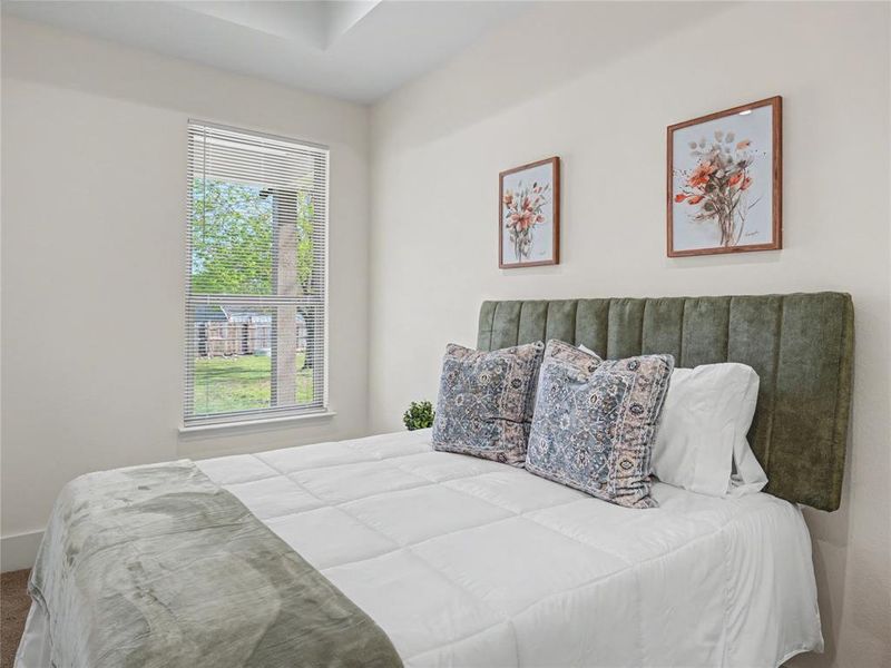 Bedroom with baseboards