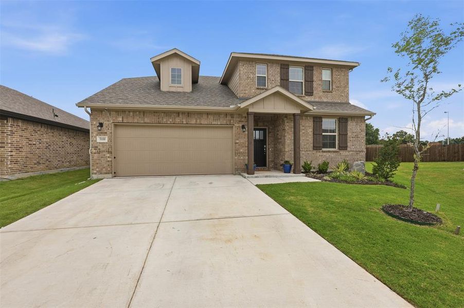 Front exterior of a new home in , Denton, TX, highlighting curb appeal (Image 21).