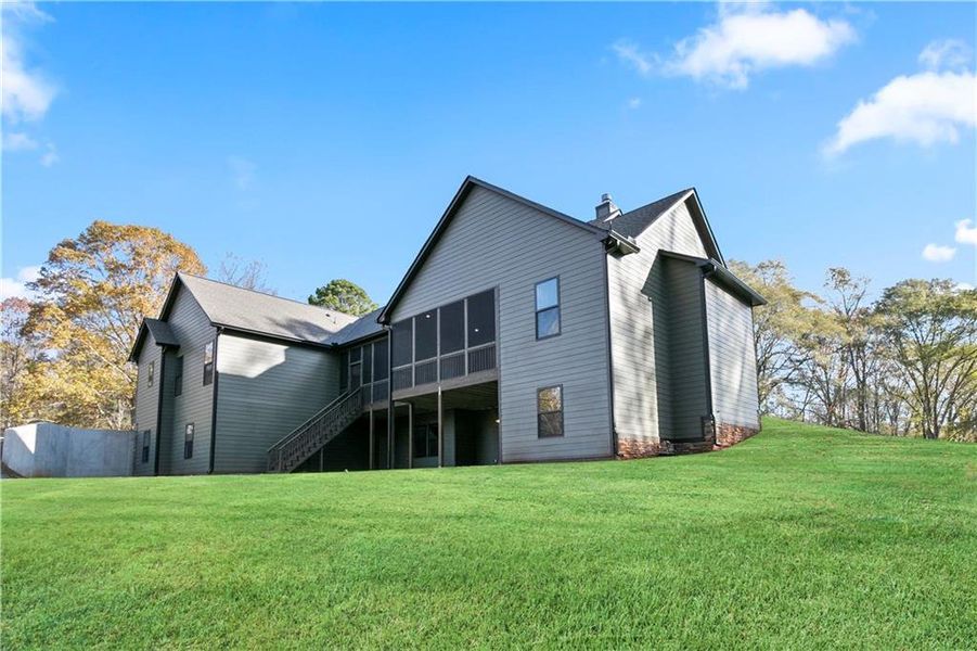 Front exterior of a new home in , Carrollton, GA, highlighting curb appeal (Image 23).