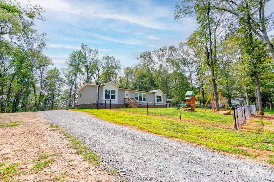 Front exterior of a new home in , Mooresboro, NC, highlighting curb appeal (Image 20).