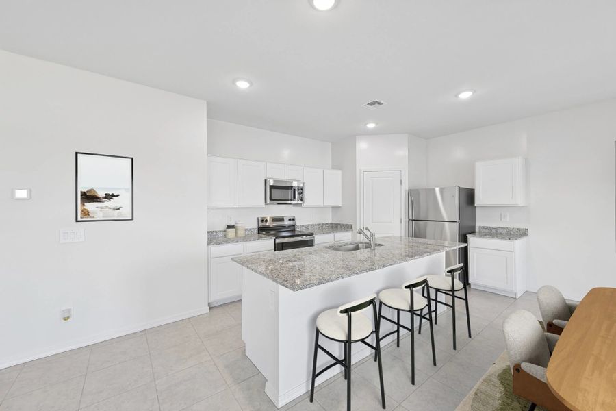 Representative furnished interior of a home built from the Supernova by Starlight Homes in Stonebridge Manor, Waddell (Image 3).
