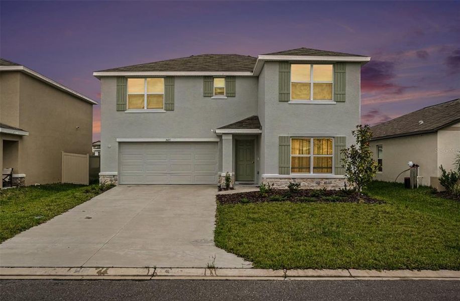 Front exterior of a new home in , Plant City, FL, highlighting curb appeal (Image 2). Front exterior of a new home in , Plant City, FL, highlighting curb appeal (Image 2).