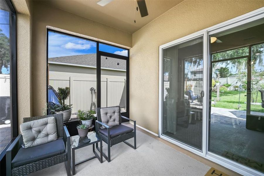 Exterior details and patio area of a home in Windrose, Apopka (Image 25).