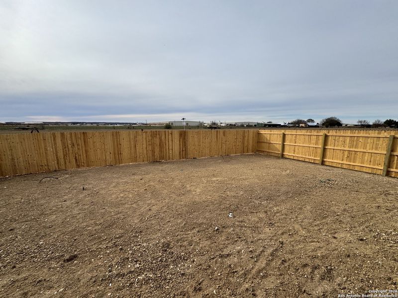 Exterior details and patio area of a home in Megan's Landing 50's, Castroville (Image 18).