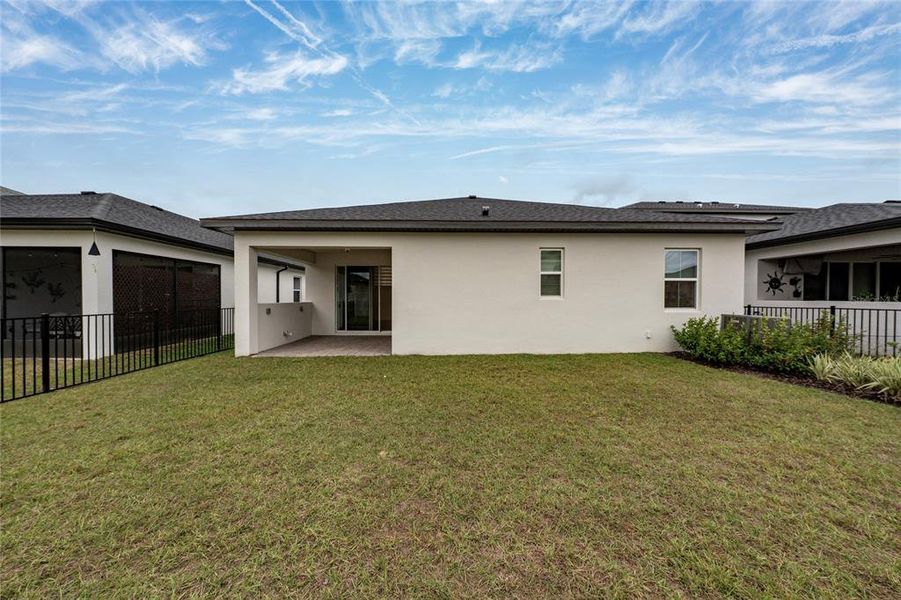 Exterior details and patio area of a home in Havenfield at Crossprairie, St. Cloud (Image 3).