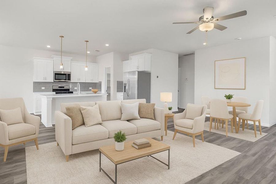 Bright and open living space with seamless flow to kitchen and dining, and stylish neutral tones throughout—ideal for entertaining.