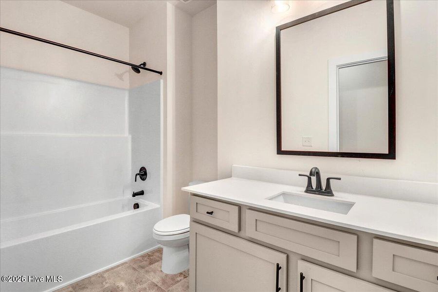 Furnished interior view inside a new home in Wood Creek, Leland (Image 11).