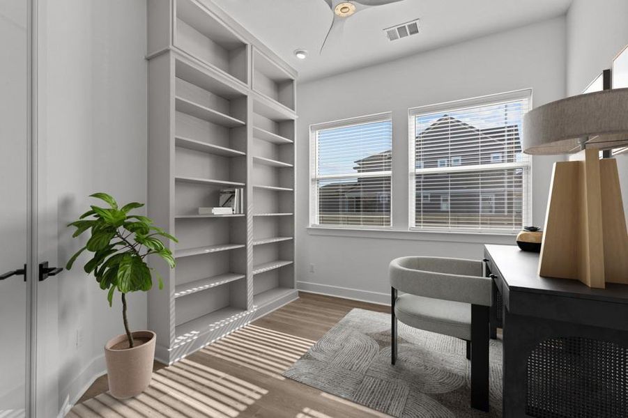 Office area featuring light wood finished floors and baseboards