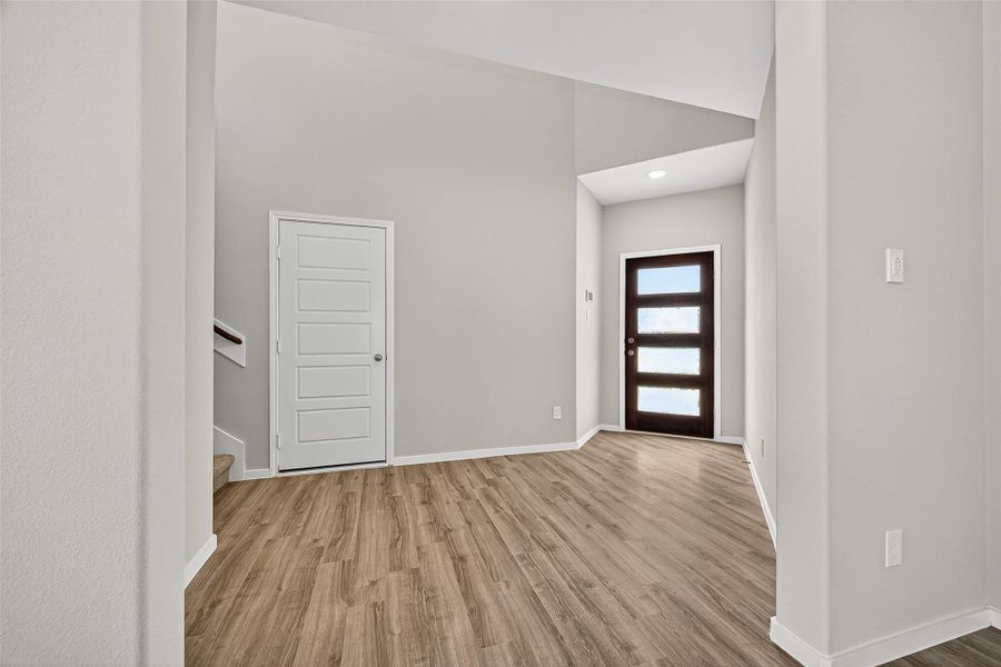 Spacious, unfurnished interior of a new home in Sunterra, Katy (Image 37).