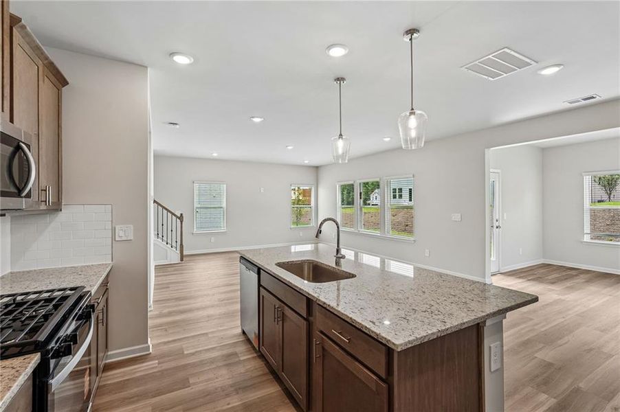 Furnished interior view inside a new home in Northwoods at Mirror Lake, Villa Rica (Image 12).