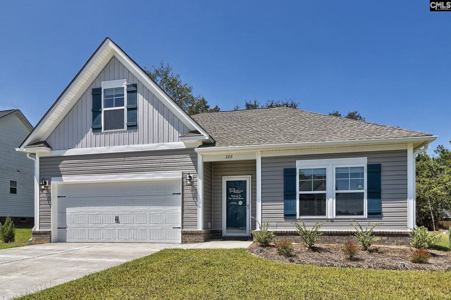Front exterior of a new home in Cottages at Roofs Pond, West Columbia, SC, highlighting curb appeal (Image 1).