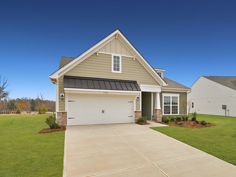 Front exterior of a new home in Roselyn: Blossom, Lancaster, SC, highlighting curb appeal (Image 1). Front exterior of a new home in Roselyn: Blossom, Lancaster, SC, highlighting curb appeal (Image 1).