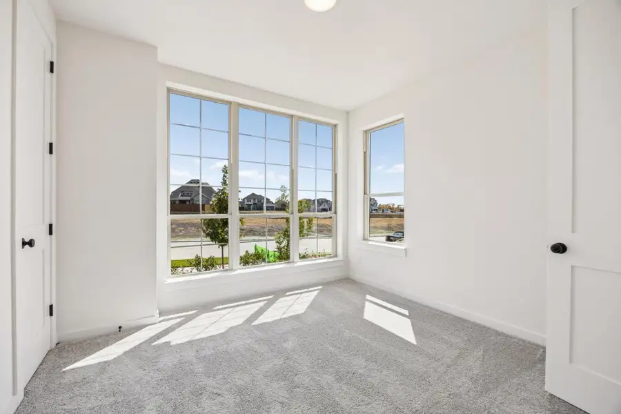 Spacious, unfurnished interior of a new home in Dominion of Pleasant Valley, Wylie (Image 18).
