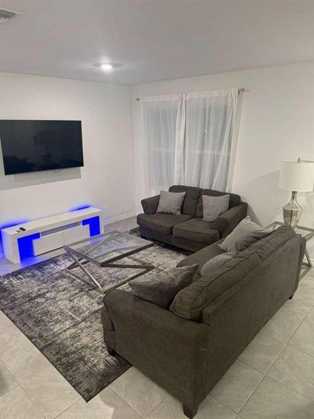 Furnished interior view inside a new home in , Winter Garden (Image 8).