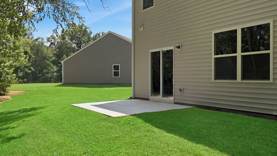 Exterior details and patio area of a home in Villa Grande, Winterville (Image 19).